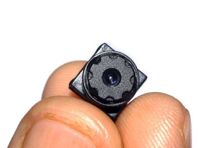 image of a tiny hidden camera on tips of fingers - Image used for a bugsweep